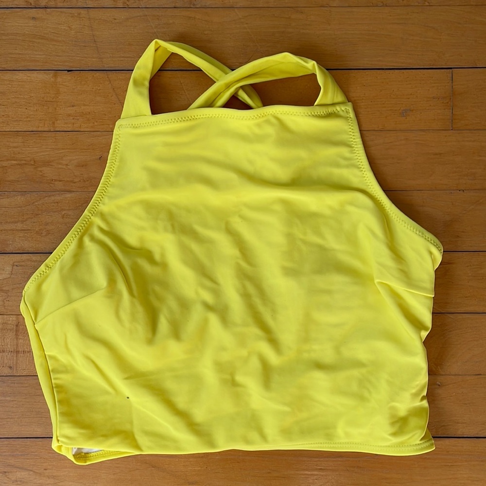 Bright yellow swim suit top
